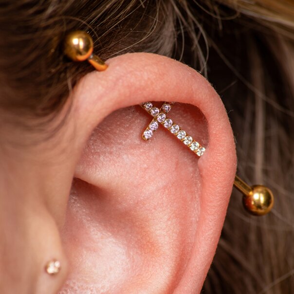Barra industrial de acero quirúrgico con cruz de cristal Blue Banana (dorada) | Joyería para piercings