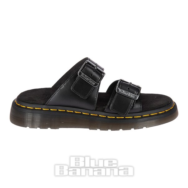 The Dr Martens Analine Josef Sandals in Black. These leather sliders are the perfect choice for summer due to their style and function. Complete with a suede foot belt and buckle fastening.